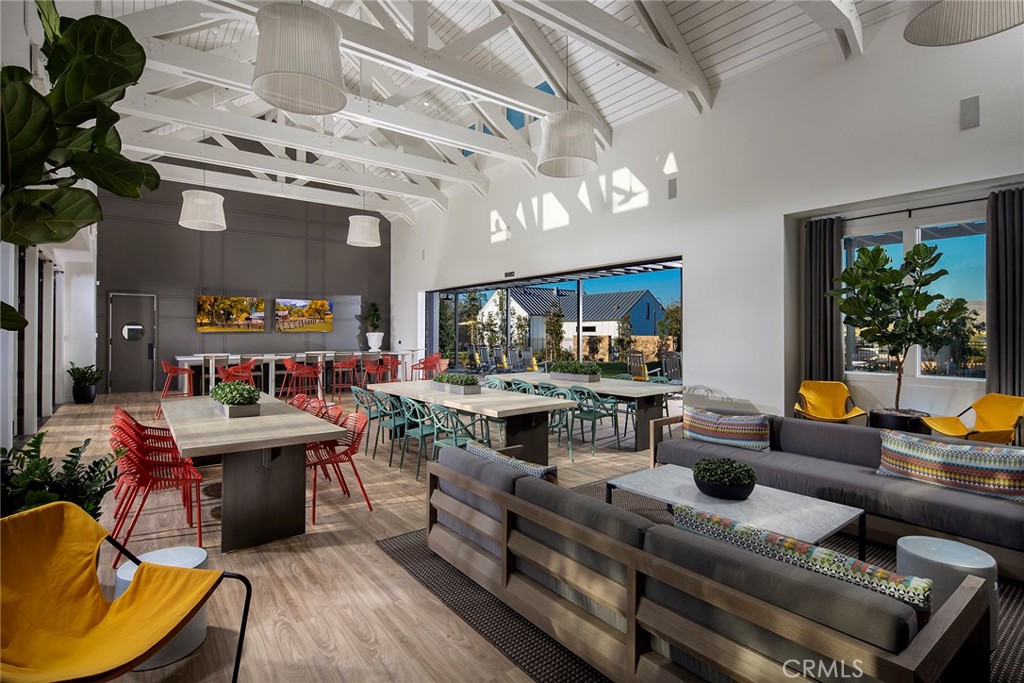 4084 Spring Lane Corona, CA 92883 - Photo 16 of 17 a living room with fireplace furniture and a large window