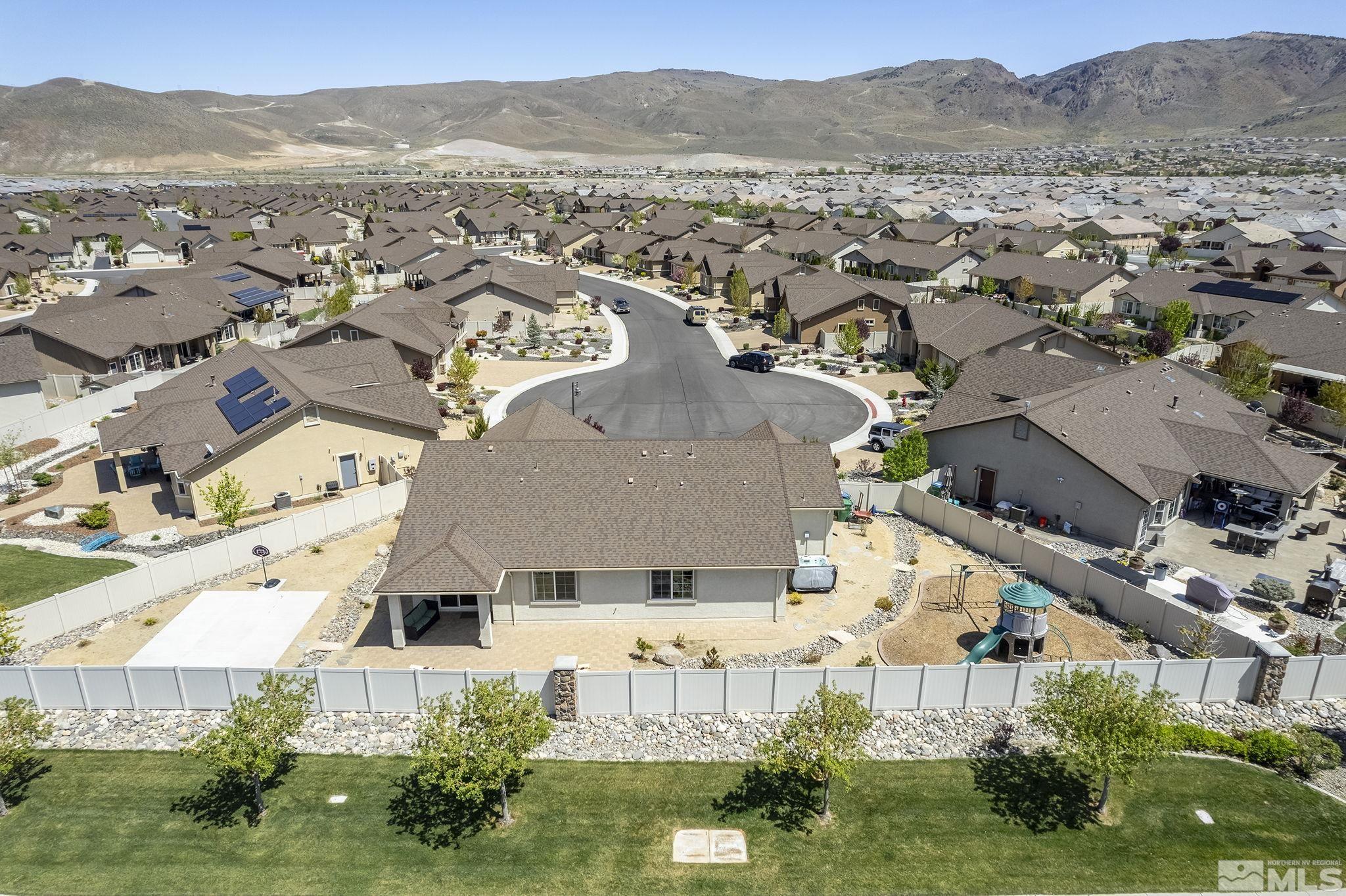 2149 Berkich Court Reno, NV 89521 - Photo 20 of 22 an aerial view of residential houses with outdoor space and trees