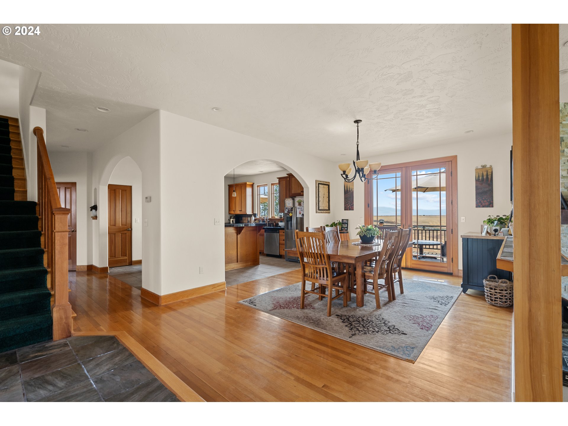 72217 Quill Point Pendleton, OR 97801 - Photo 22 of 48 a view of a dining room with furniture window and wooden floor