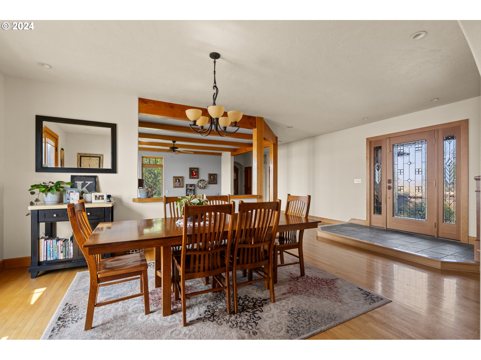 72217 Quill Point Pendleton, OR 97801 - Photo 24 of 48 a view of a dining room with furniture window and wooden floor