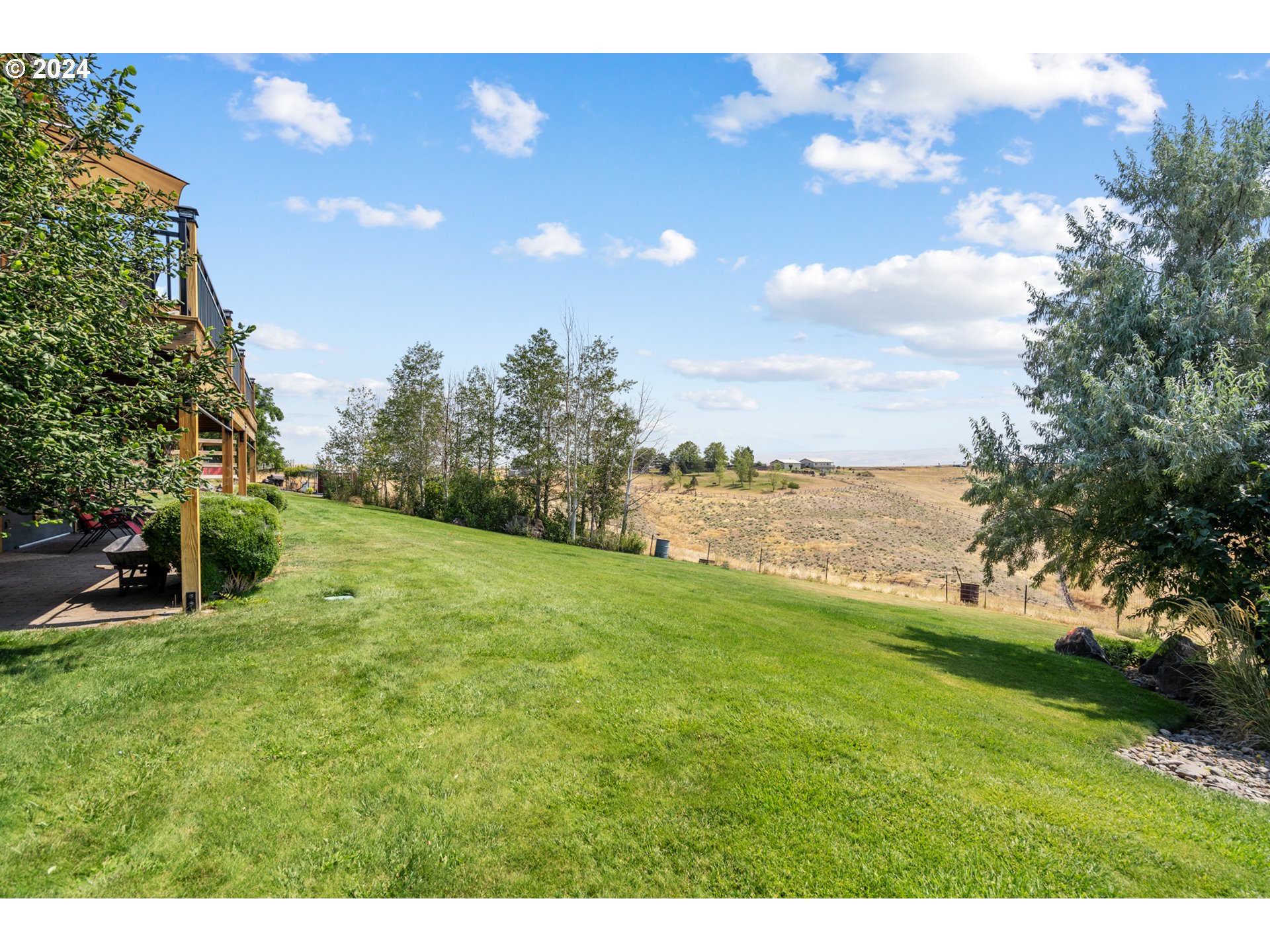 72217 Quill Point Pendleton, OR 97801 - Photo 48 of 48 a backyard of a house with lots of green space