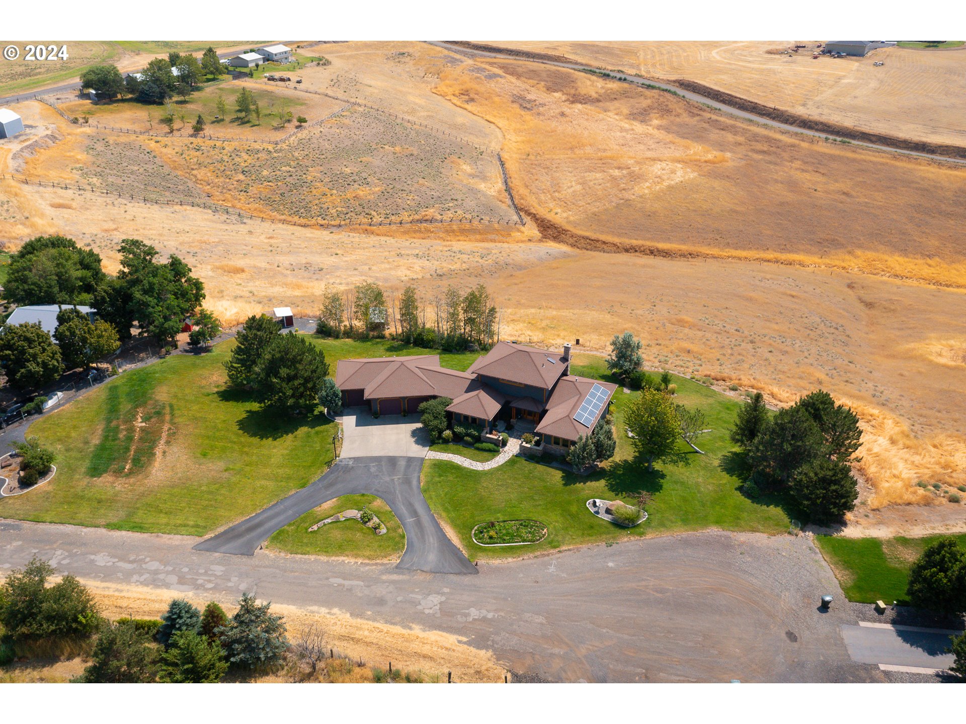 72217 Quill Point Pendleton, OR 97801 - Photo 9 of 48 an aerial view of a house with a yard basket ball court and outdoor seating