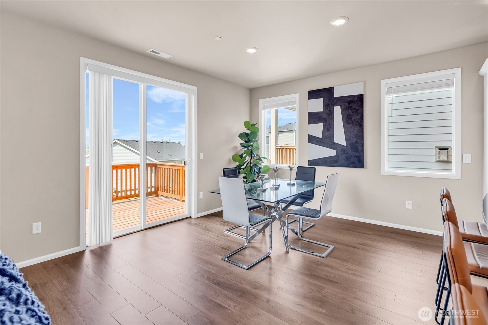 23812 Southeast 291st Street Maple Valley, WA 98010 - Photo 12 of 40 a workspace with furniture window and wooden floor