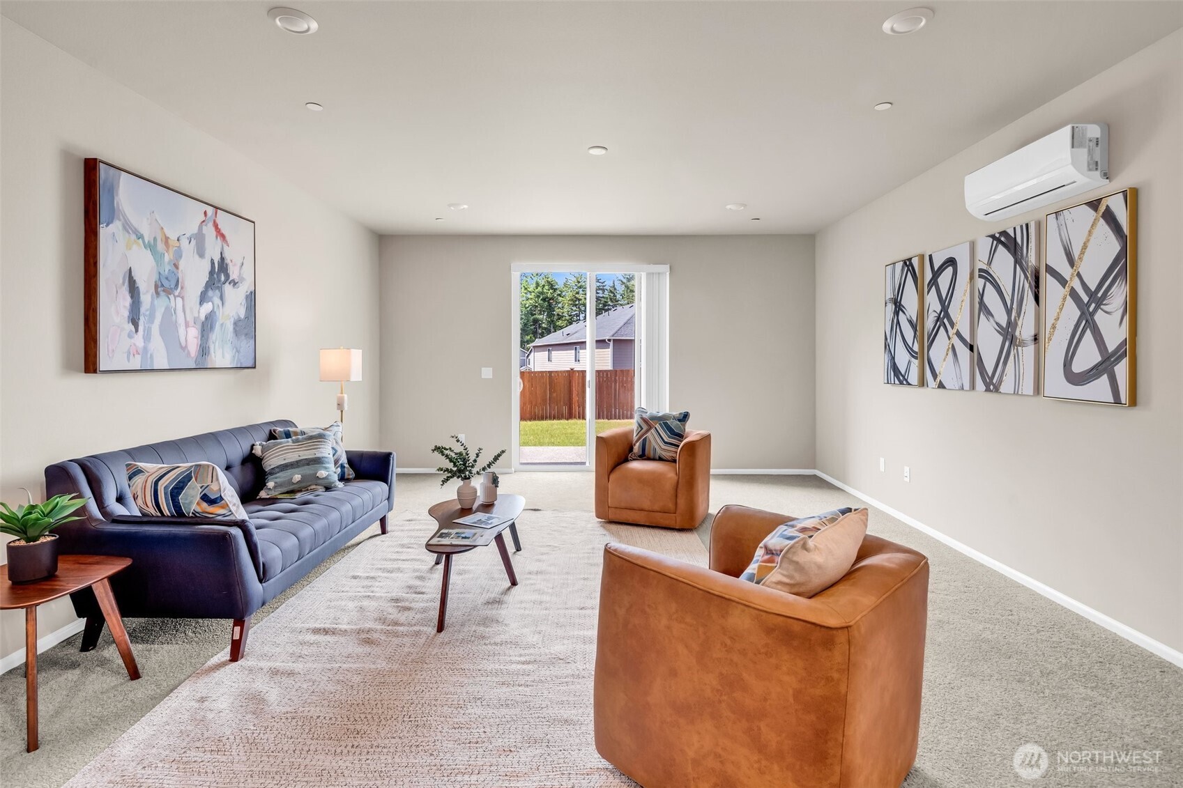 23812 Southeast 291st Street Maple Valley, WA 98010 - Photo 19 of 40 a living room with furniture and a large window