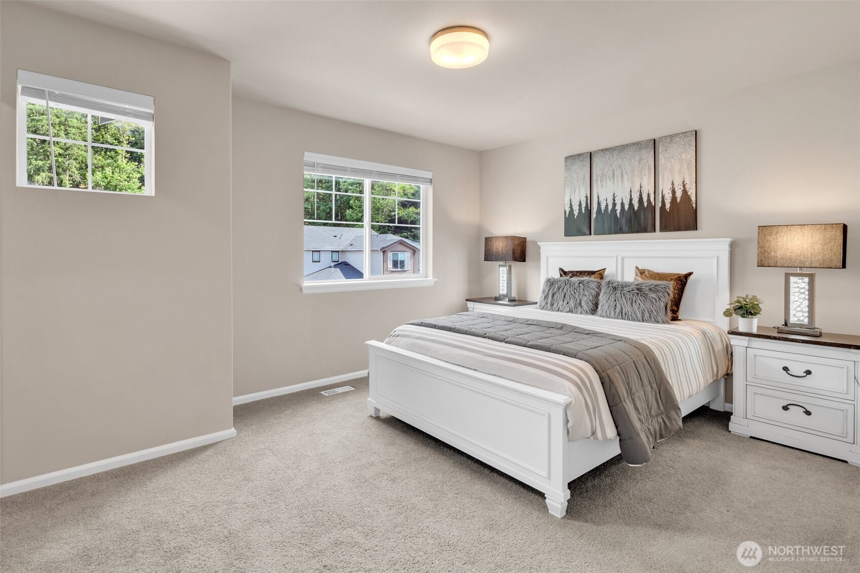 23812 Southeast 291st Street Maple Valley, WA 98010 - Photo 24 of 40 a spacious bedroom with a bed and a window