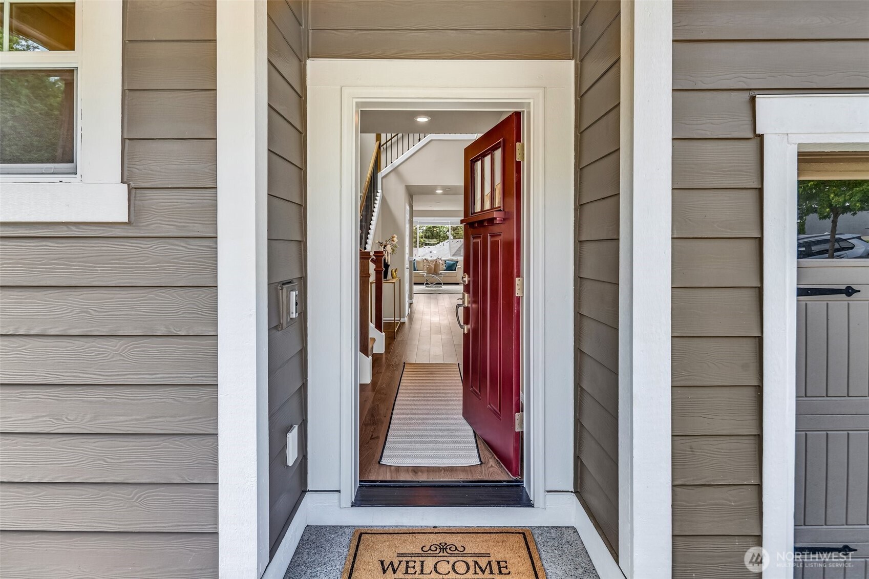 23812 Southeast 291st Street Maple Valley, WA 98010 - Photo 3 of 40 a view of a entryway door of the house