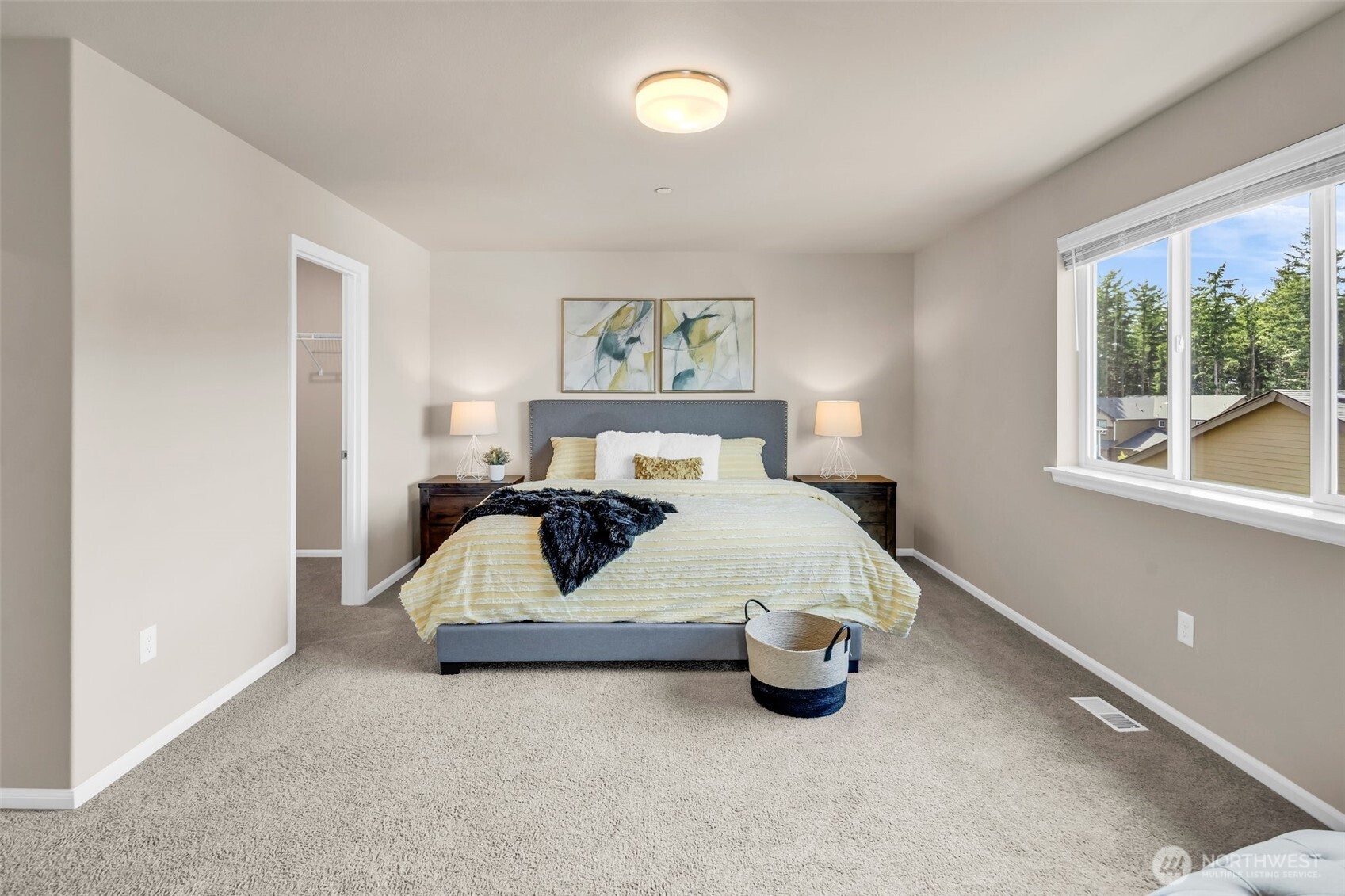 23812 Southeast 291st Street Maple Valley, WA 98010 - Photo 33 of 40 a bedroom with a bed and a large window