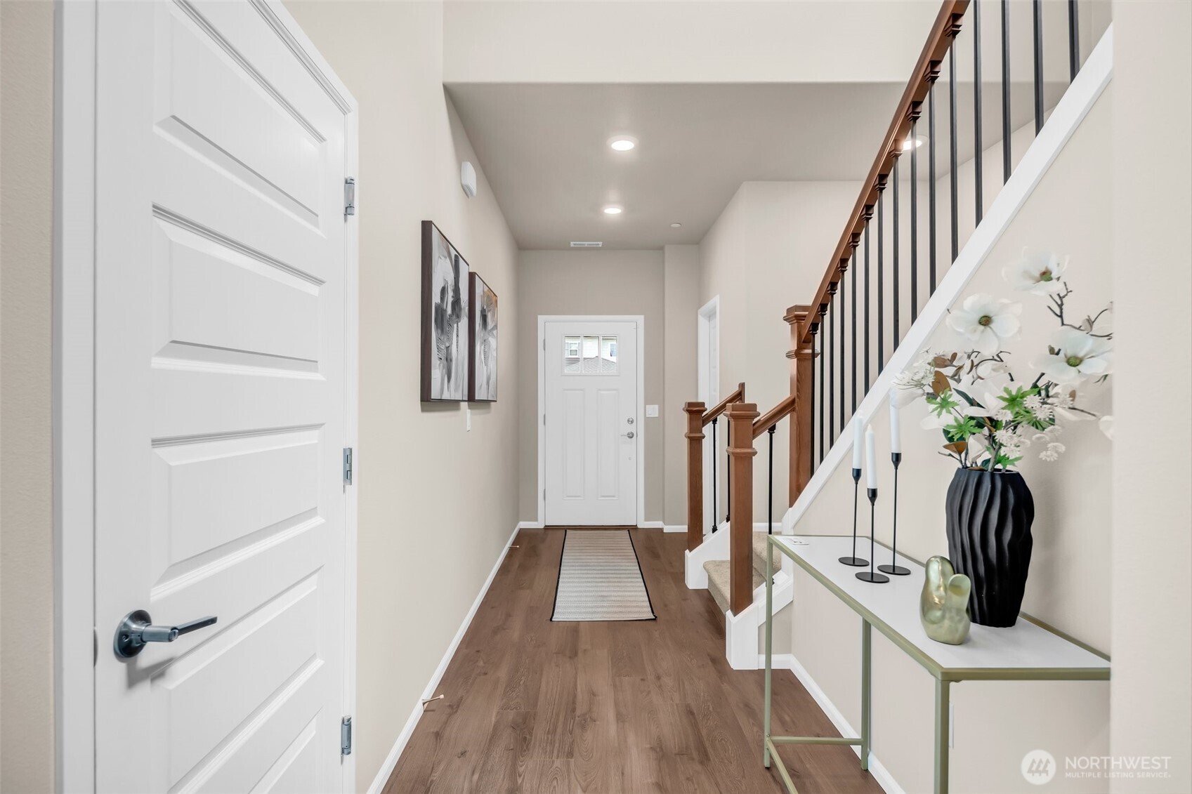 23812 Southeast 291st Street Maple Valley, WA 98010 - Photo 5 of 40 a view of entryway and hall with wooden floor