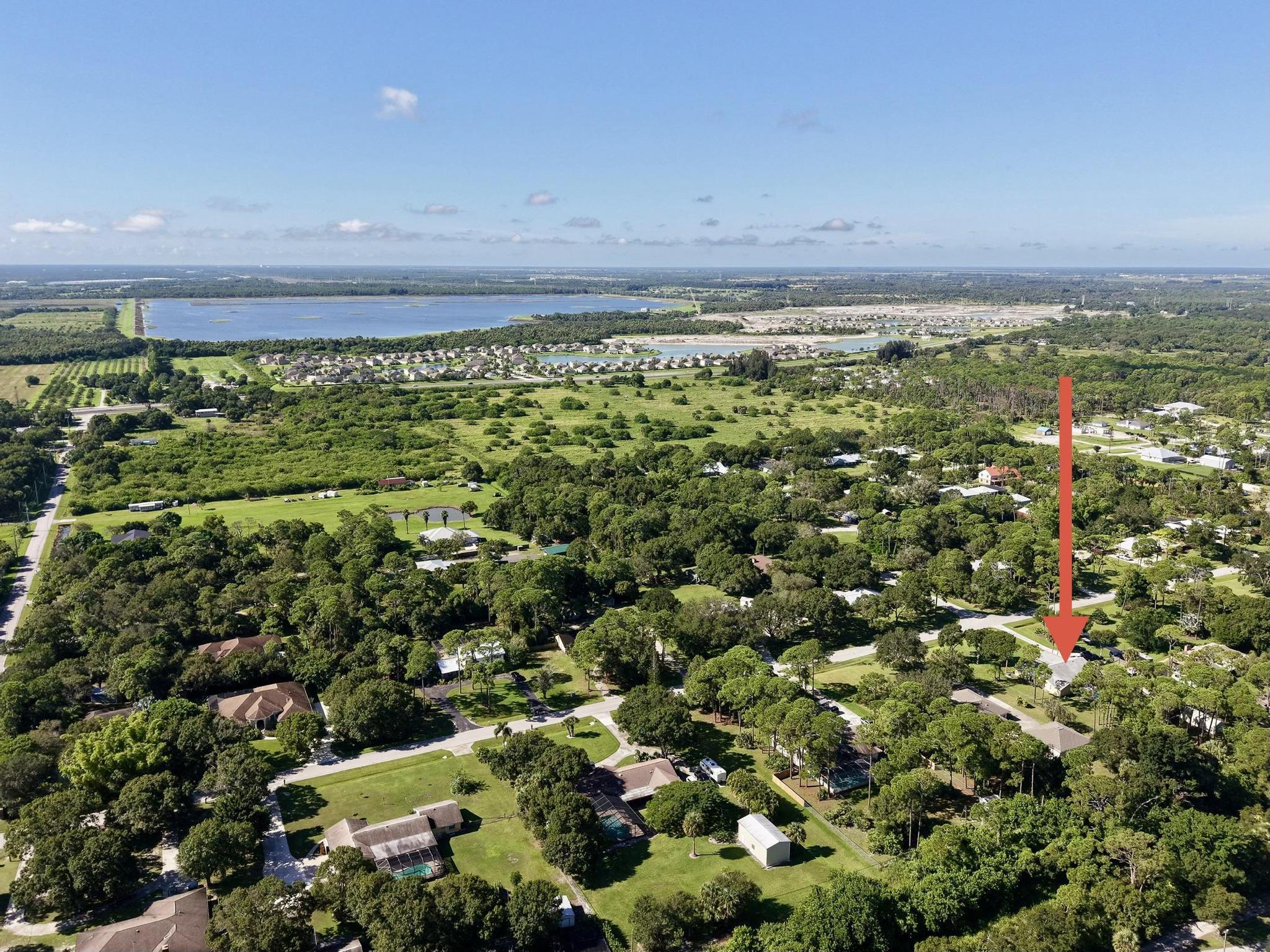 8330 Hidden Pines Road Fort Pierce, FL 34945 - Photo 33 of 34 a view of a garden with an outdoor space