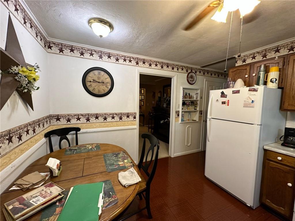 696 Leighty Hollow Road Ruffs Dale, PA 15679 - Photo 17 of 46 a view of a refrigerator and washer