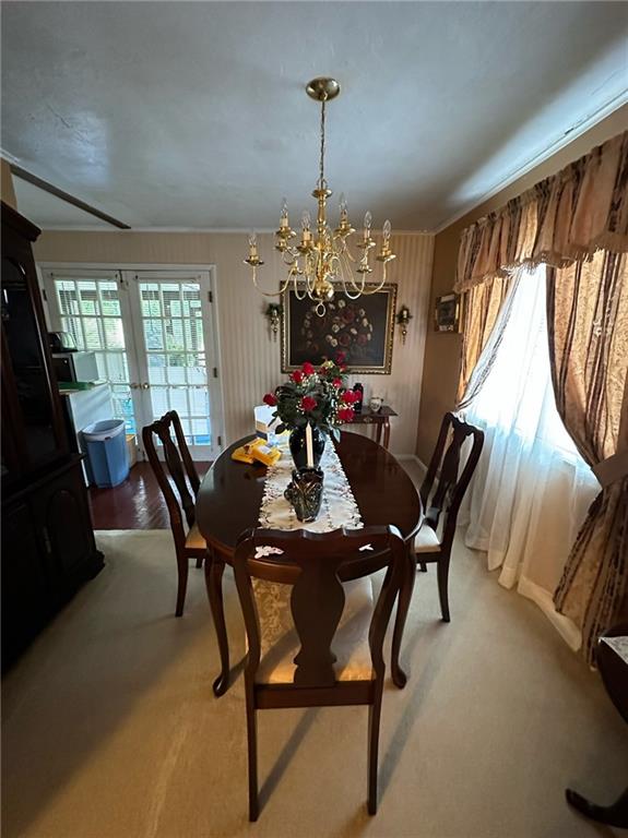 696 Leighty Hollow Road Ruffs Dale, PA 15679 - Photo 19 of 46 a view of a dining room with furniture and window