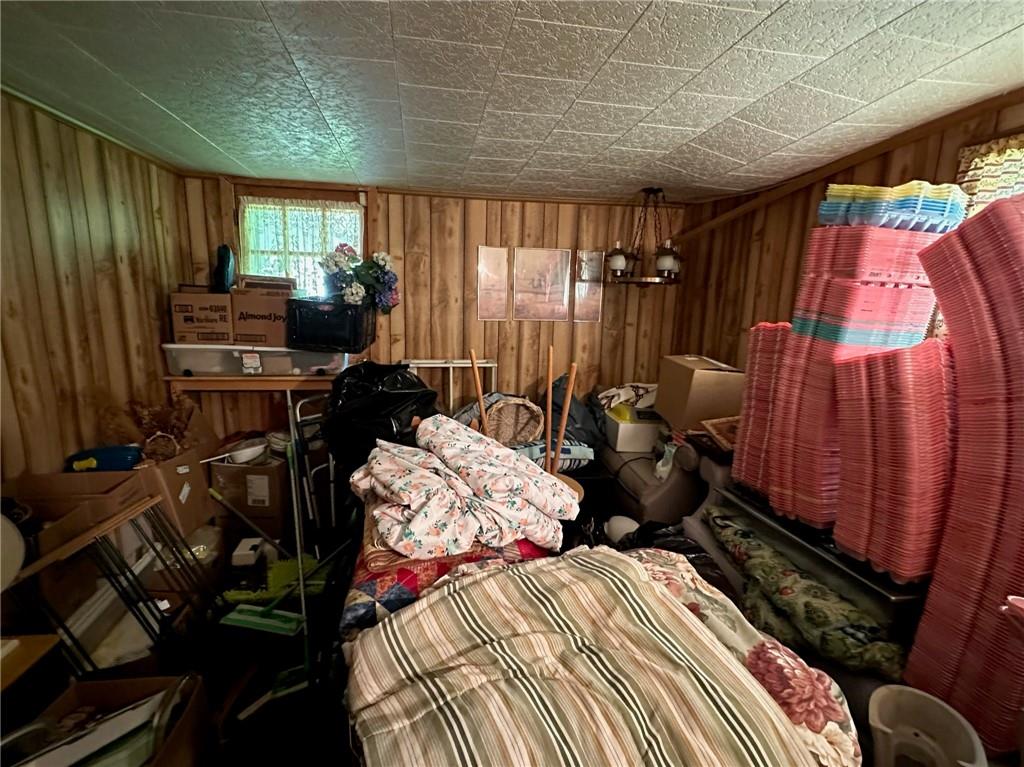 696 Leighty Hollow Road Ruffs Dale, PA 15679 - Photo 36 of 46 a bed room with a bed and a television