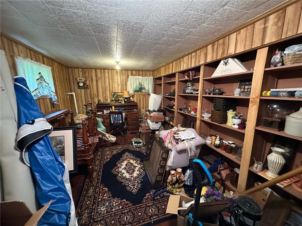 696 Leighty Hollow Road Ruffs Dale, PA 15679 - Photo 38 of 46 a living room with lots of furniture and book shelf