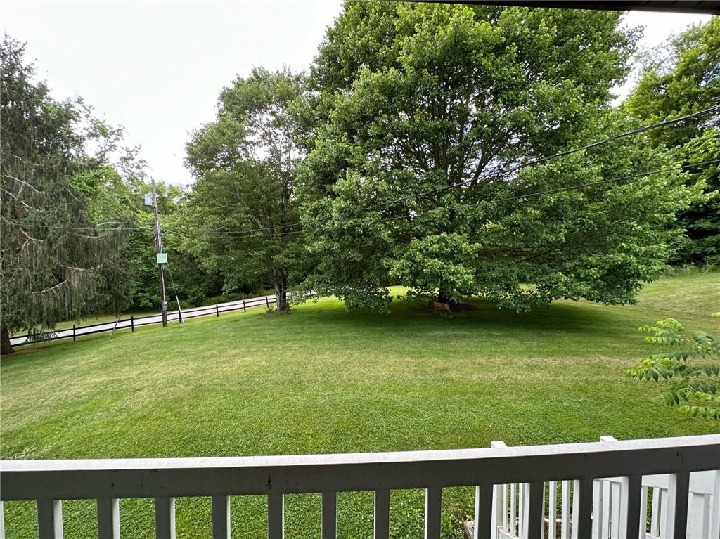 696 Leighty Hollow Road Ruffs Dale, PA 15679 - Photo 6 of 46 a view of a golf course with a lake