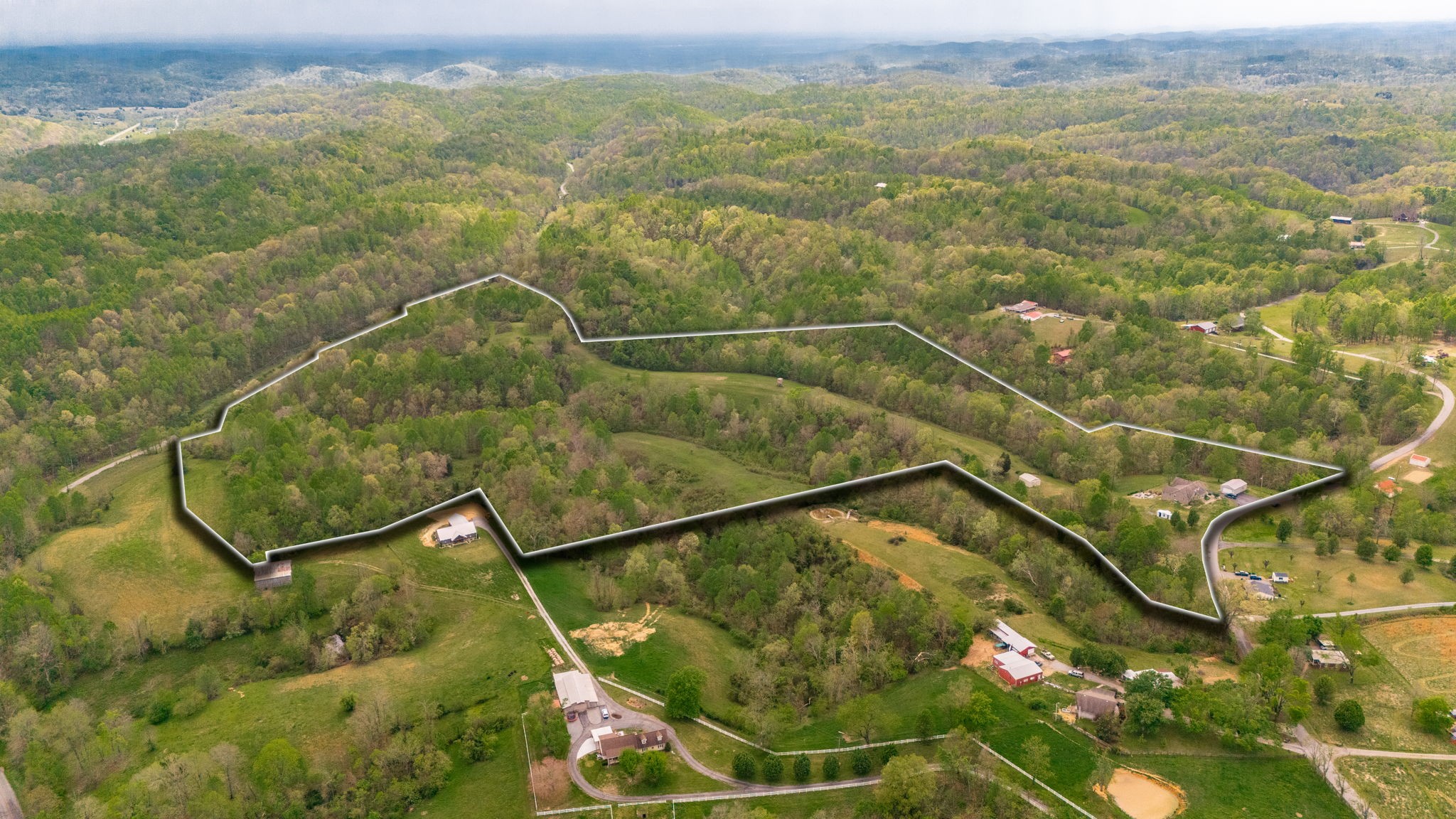 1103 Johnny Spears Road Westmoreland, TN 37186 - Photo 2 of 100 a view of a yard
