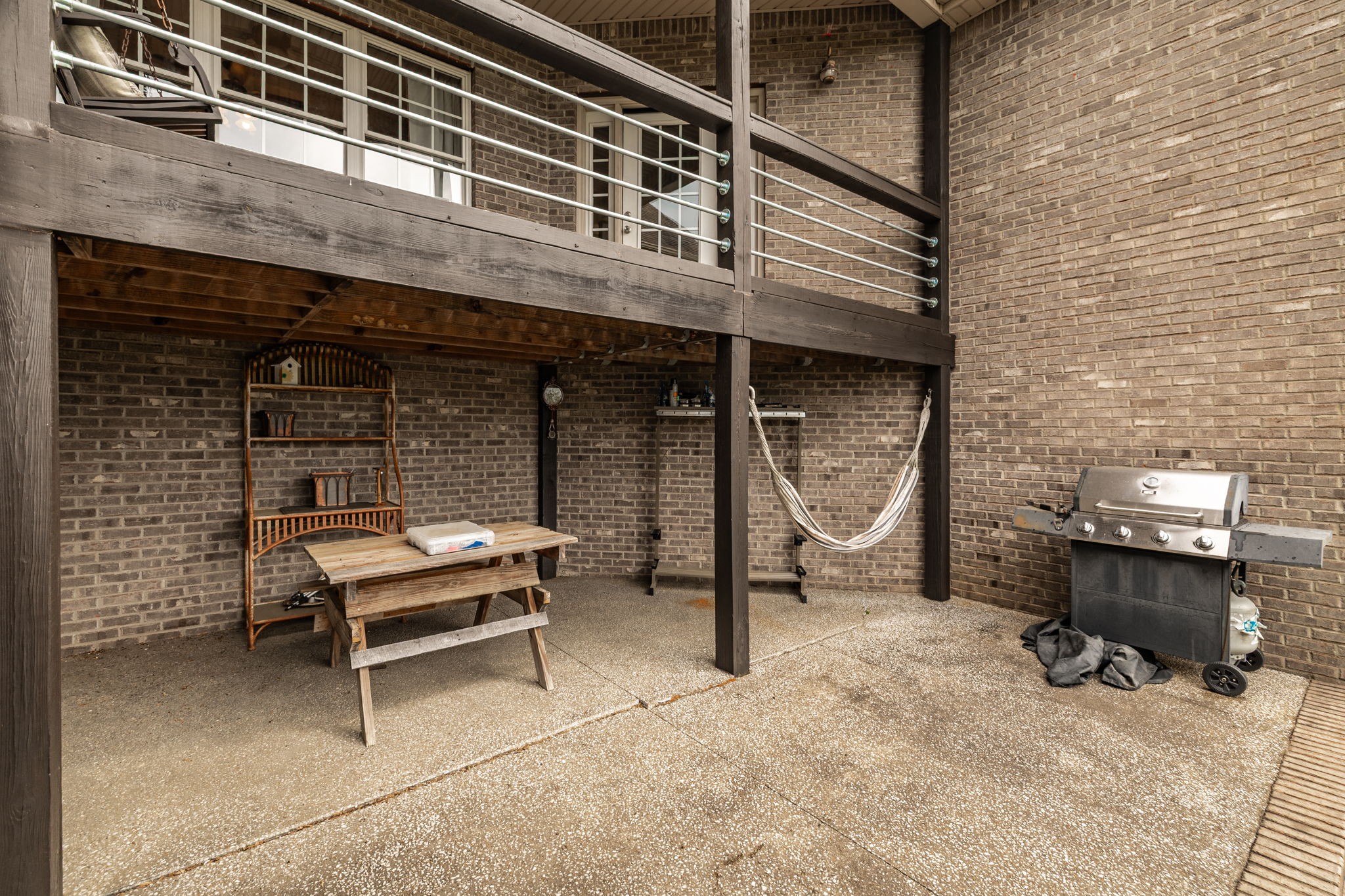 1103 Johnny Spears Road Westmoreland, TN 37186 - Photo 30 of 100 a backyard of a house with barbeque oven table and chairs