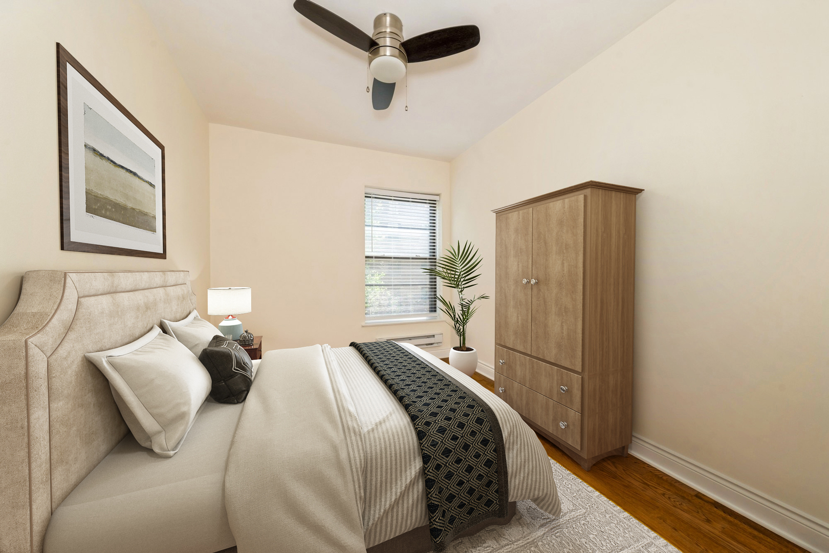 1006 East 54th Street, Unit J2 Chicago, IL 60615 - Photo 12 of 15 a bedroom with a bed and a window