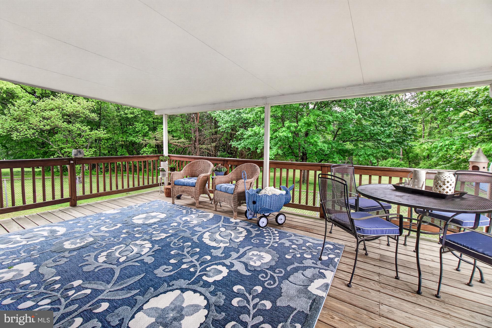 5601 Woodville Road Mount Airy, MD 21771 - Photo 16 of 54 a view of a patio with wooden floor