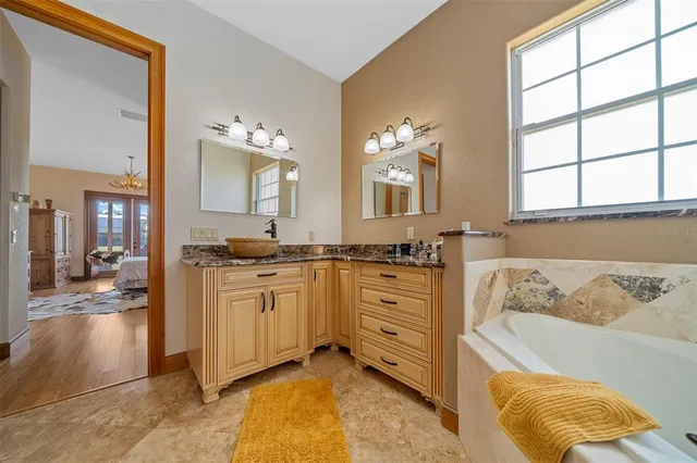 a bed room with a bed and a dresser