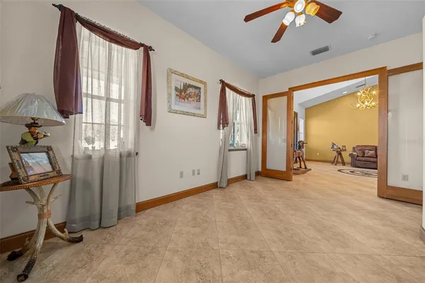 a kitchen with stainless steel appliances granite countertop a refrigerator a oven and a sink