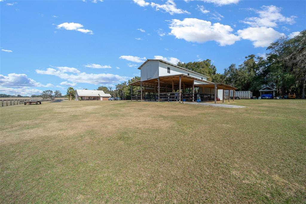 2198 West Highway 329 Citra, FL 32113 - Photo 42 of 57 a view of a patio with a yard