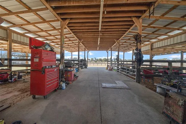 a view of swimming pool with seating space