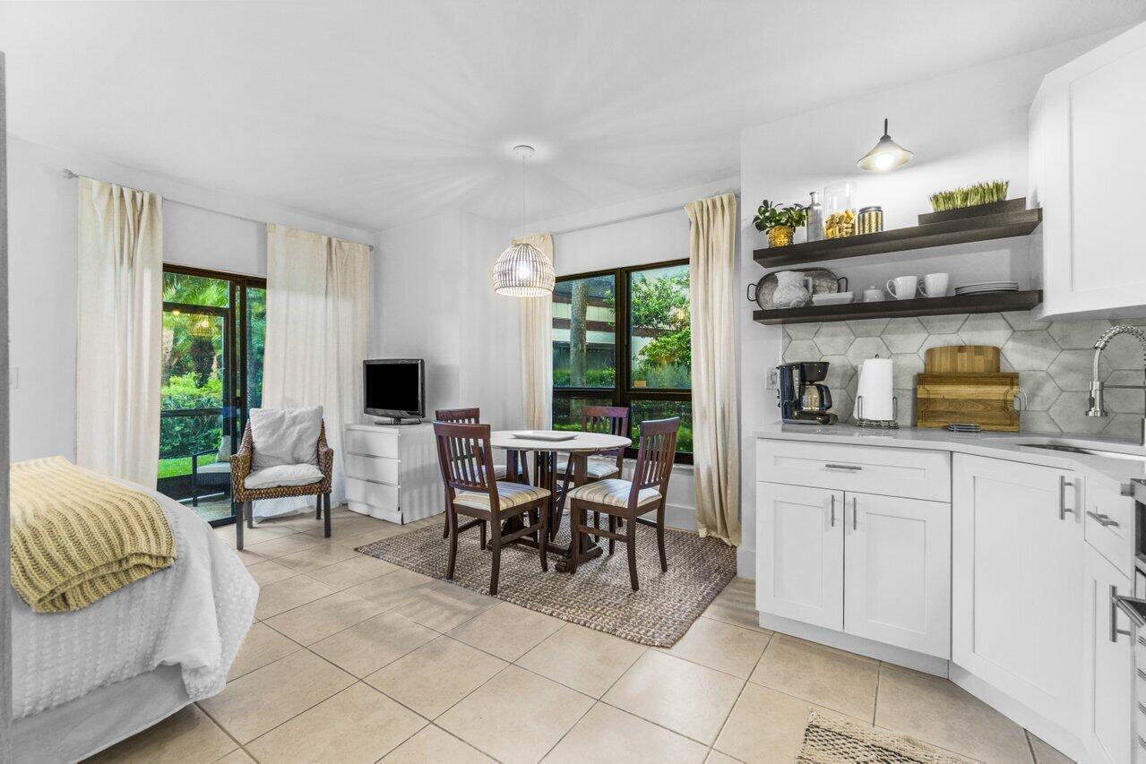 13334 Polo Club Road, Unit 207 Wellington, FL 33414 - Photo 12 of 22 Dining and Kitchen view