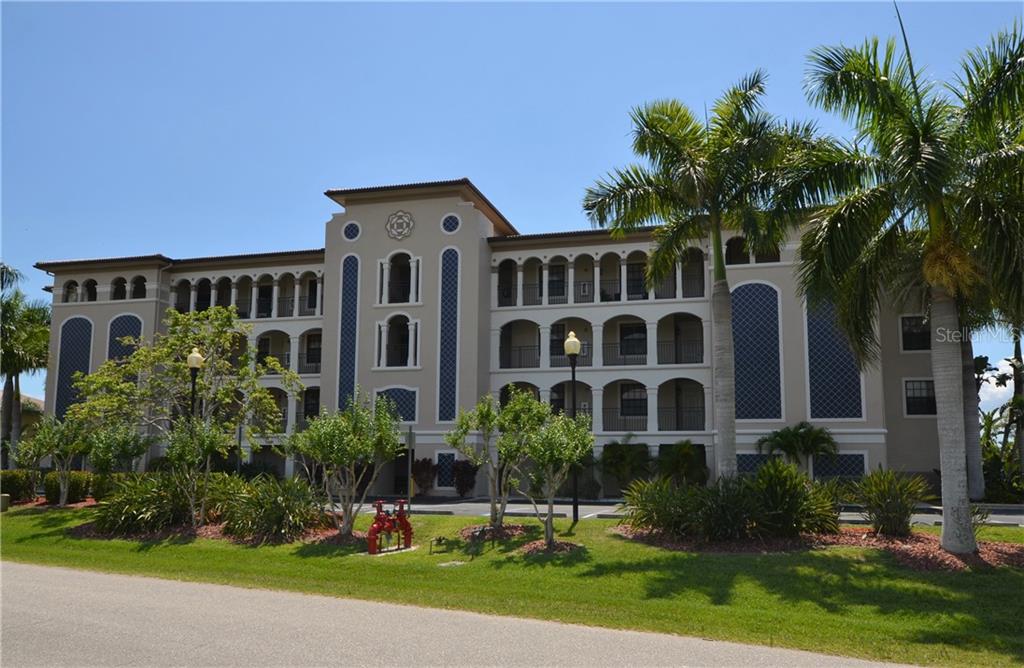 PUNTA GORDA ISLES! LIKE NEW-HARDLY LIVED IN 2BD+DEN, 2BA 2ND FLOOR WATERFRONT LUXURY CONDO WITH SAILBOAT ACCESS TO CHARLOTTE HARBOR LEADING TO GULF OF MEXICO!