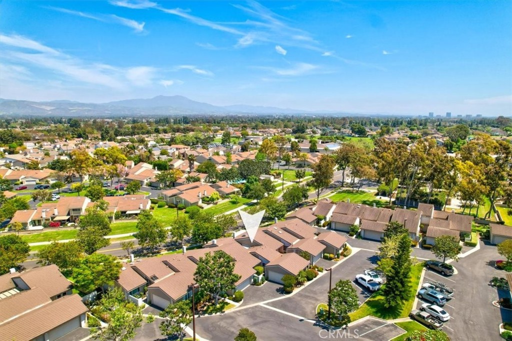 86 Sandpiper, Unit 17 Irvine, CA 92604 - Photo 2 of 56 an aerial view of residential houses with outdoor space