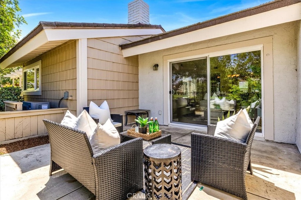 86 Sandpiper, Unit 17 Irvine, CA 92604 - Photo 30 of 56 a view of a patio with furniture