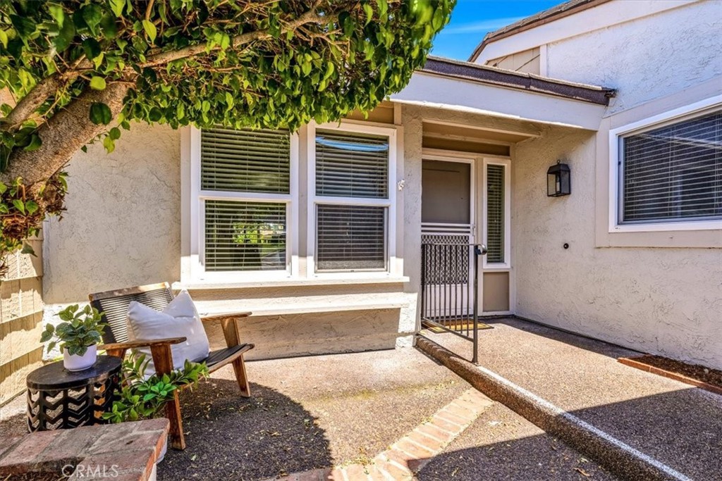 86 Sandpiper, Unit 17 Irvine, CA 92604 - Photo 34 of 56 a view of house with outdoor space and sitting area