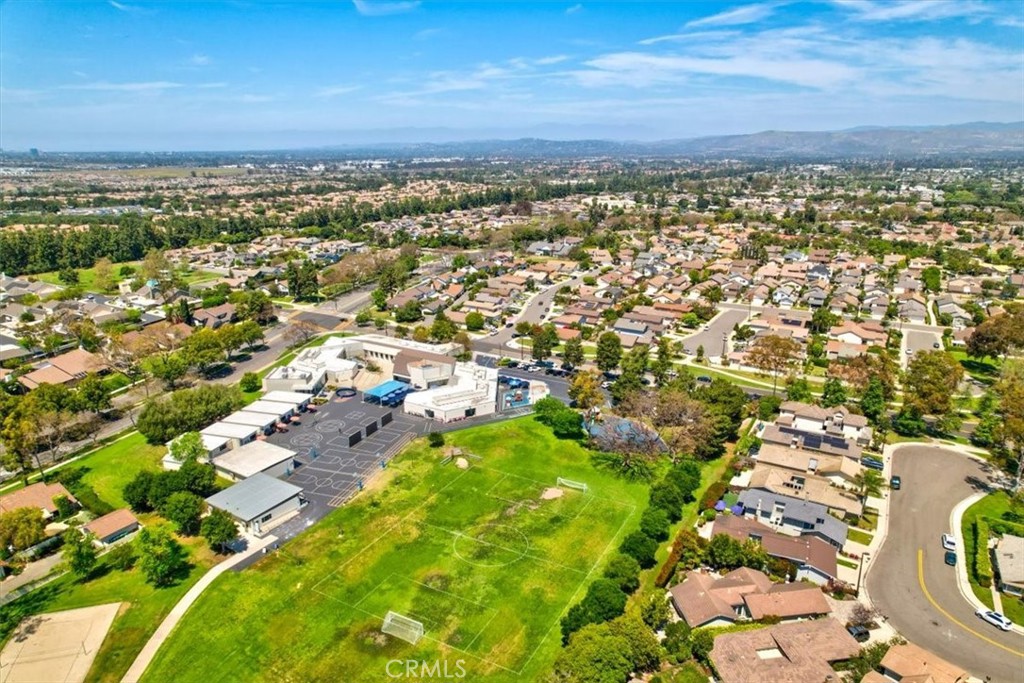 86 Sandpiper, Unit 17 Irvine, CA 92604 - Photo 43 of 56 an aerial view of residential building with parking space