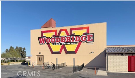 86 Sandpiper, Unit 17 Irvine, CA 92604 - Photo 53 of 56 a sign that is on the wall of building