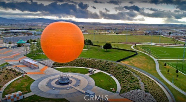 86 Sandpiper, Unit 17 Irvine, CA 92604 - Photo 55 of 56 a view of a swimming pool with a table and chairs