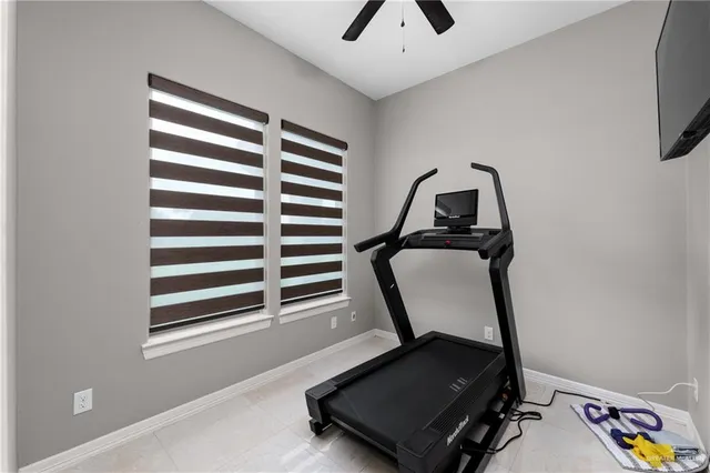 a view of a room with gym equipment