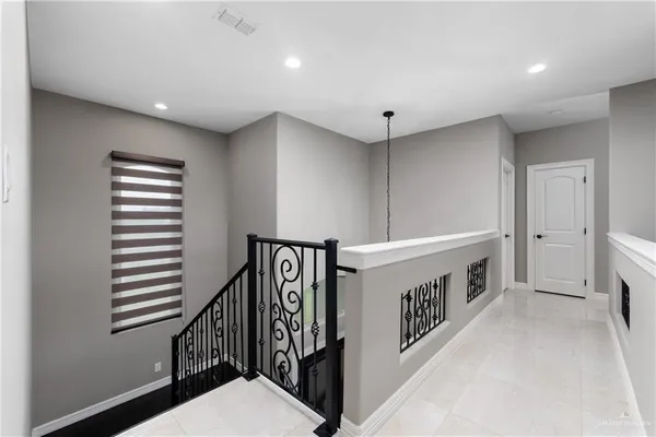 a view of a hallway with entryway