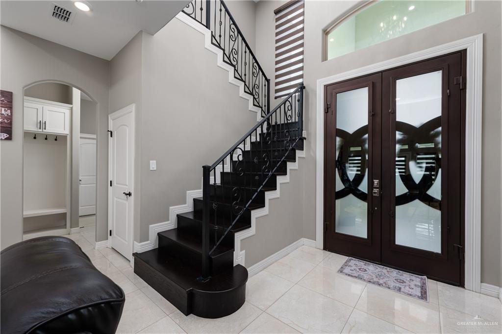 8405 Summer View Court Harlingen, TX 78552 - Photo 4 of 45 a living room with furniture and a floor to ceiling window