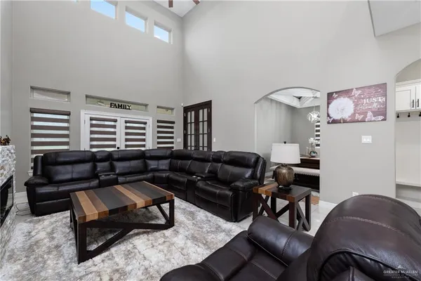 a living room with furniture and a window