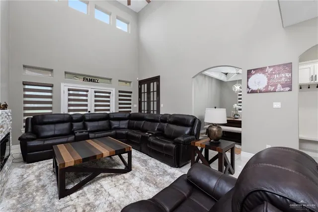 a living room with furniture and a window