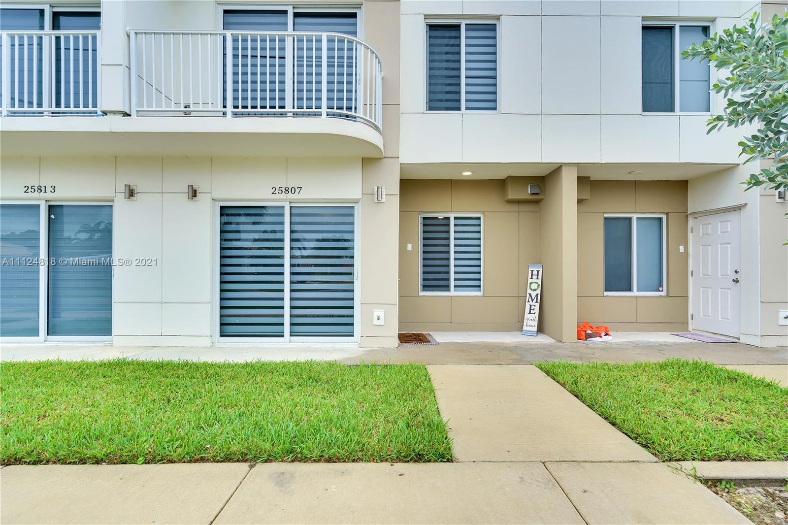25807 Southwest 139th Court Homestead, FL 33032 - Photo 1 of 32 a view of a house with a yard