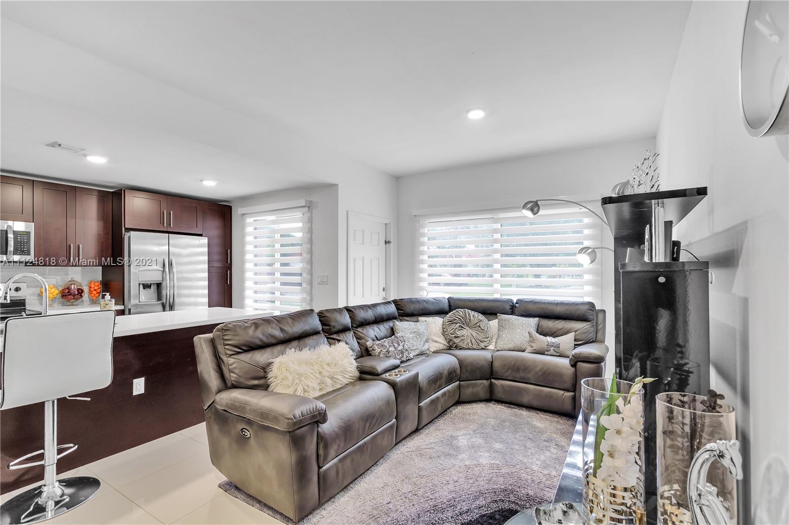 25807 Southwest 139th Court Homestead, FL 33032 - Photo 14 of 32 a living room with furniture and a large window