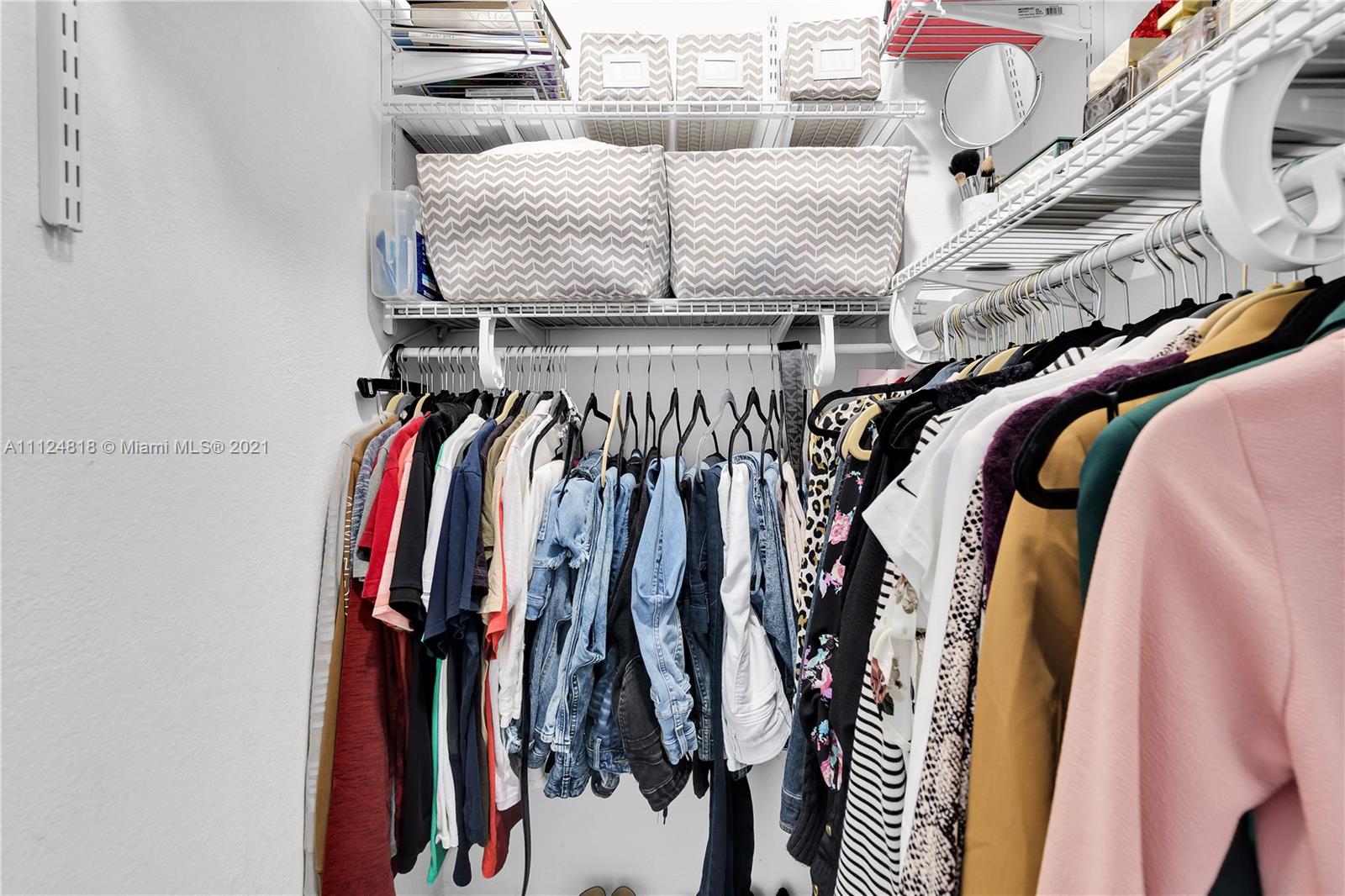 25807 Southwest 139th Court Homestead, FL 33032 - Photo 29 of 32 a view of walk in closet with clothes and shoes