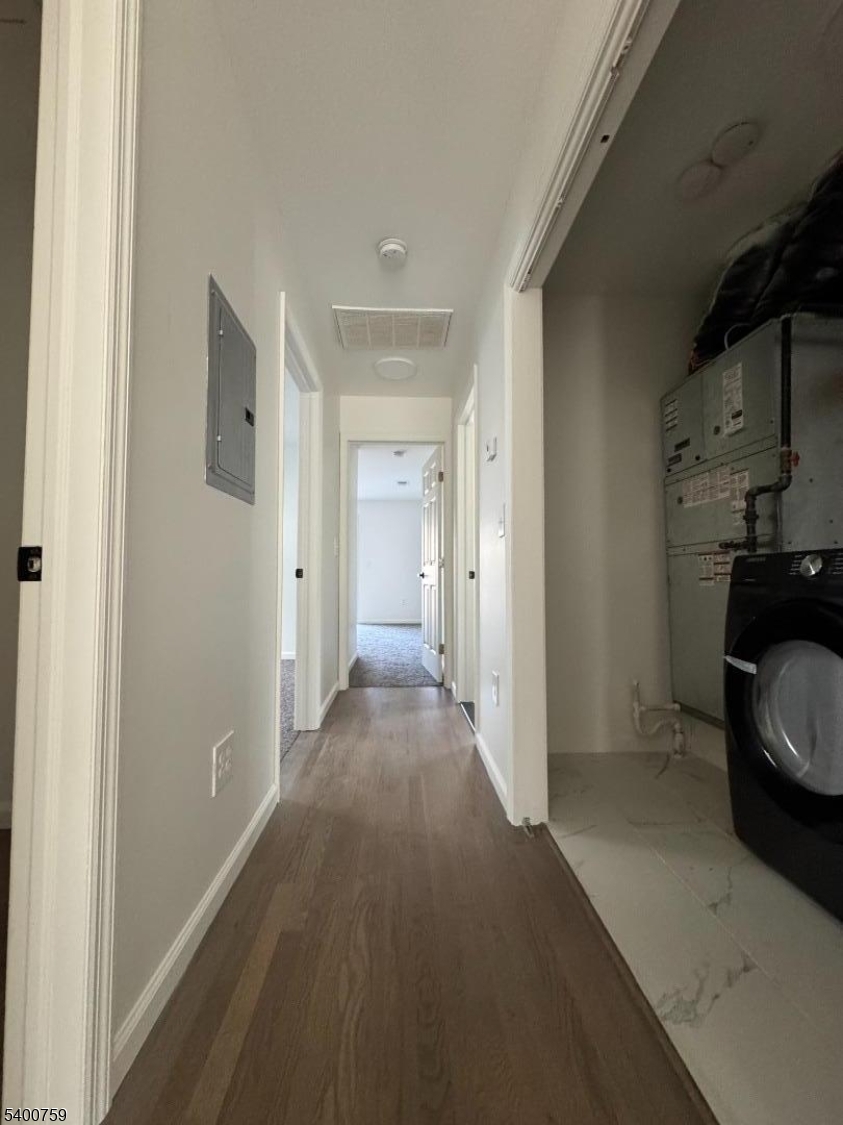 121 12th Avenue Paterson, NJ 07501 - Photo 8 of 14 a view of a livingroom with wooden floor and a sink