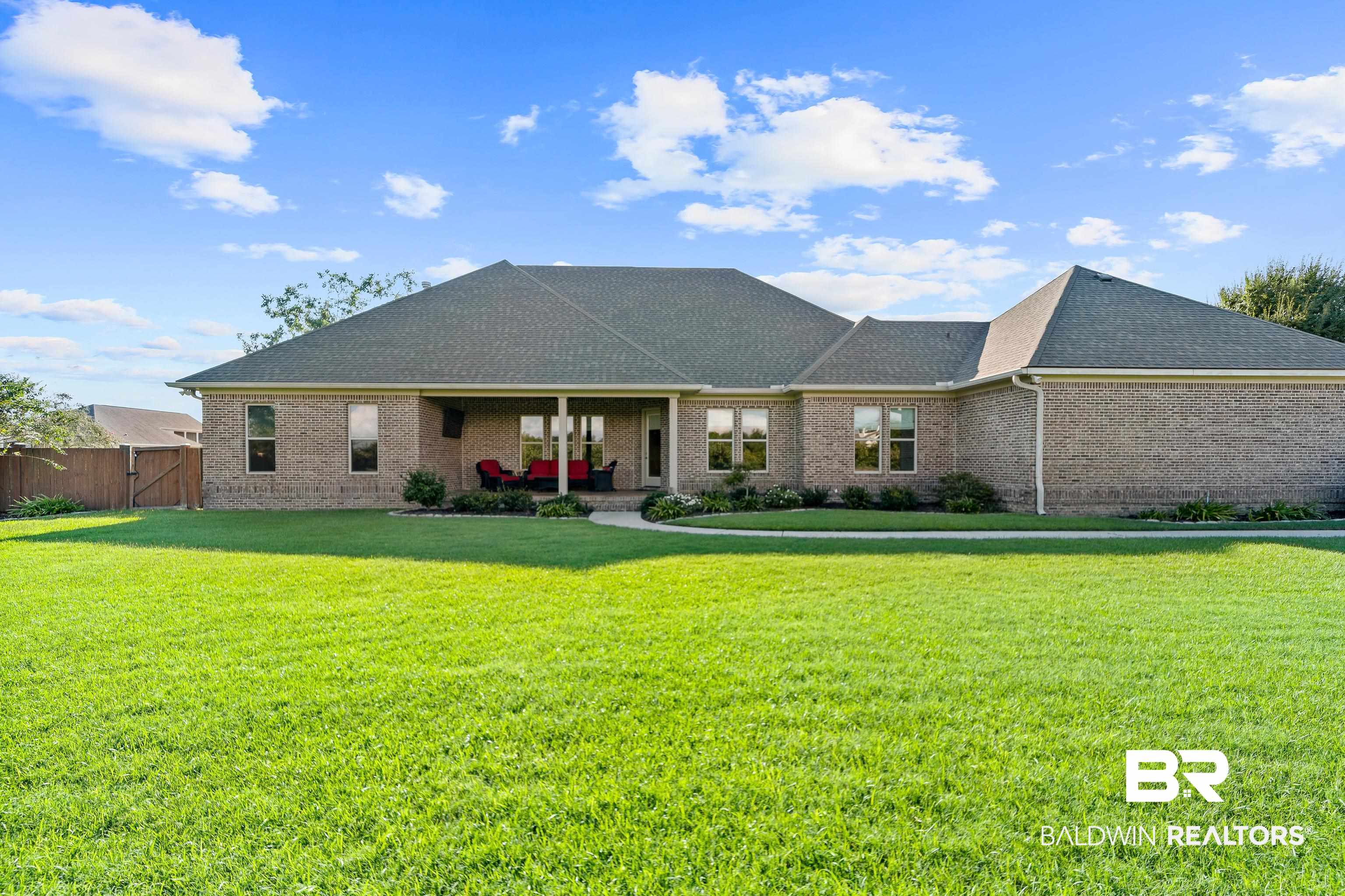 17663 Burwick Loop Fairhope, AL 36532 - Photo 41 of 41 View of front facade featuring a front lawn