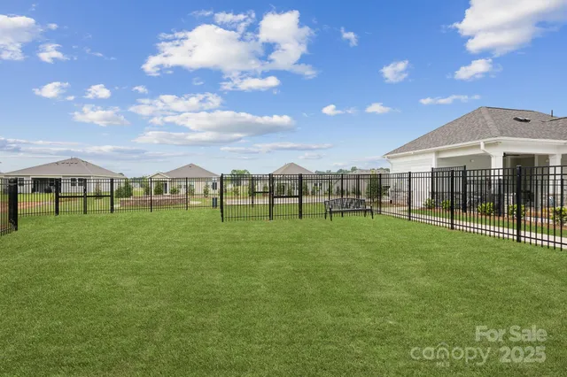 a view of a house with a big yard