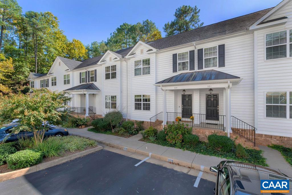 329 Quarry Road Charlottesville, VA 22902 - Photo 41 of 45 a front view of a house with a yard and trees