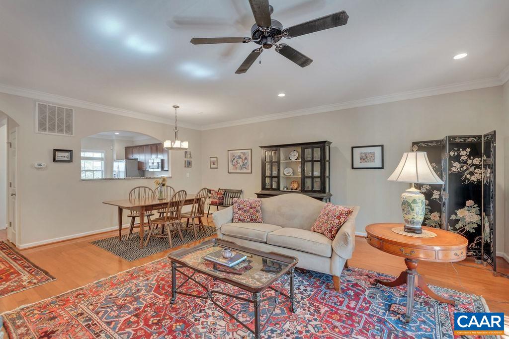 329 Quarry Road Charlottesville, VA 22902 - Photo 8 of 45 a living room with furniture a rug and a flat screen tv
