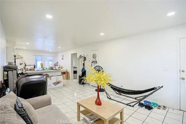 a kitchen with a white cabinets and white appliances