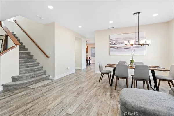 a view of a dining room with furniture