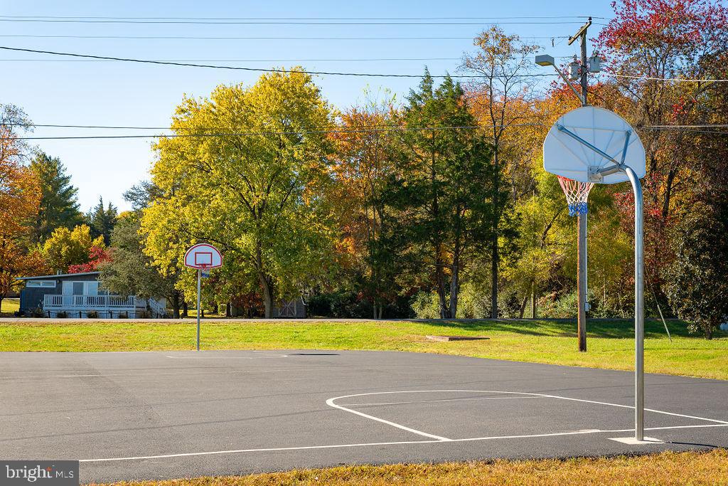 0 Redbud Drive Louisa, VA 23093 - Photo 6 of 16 a view of swimming pool with an outdoor space and seating area
